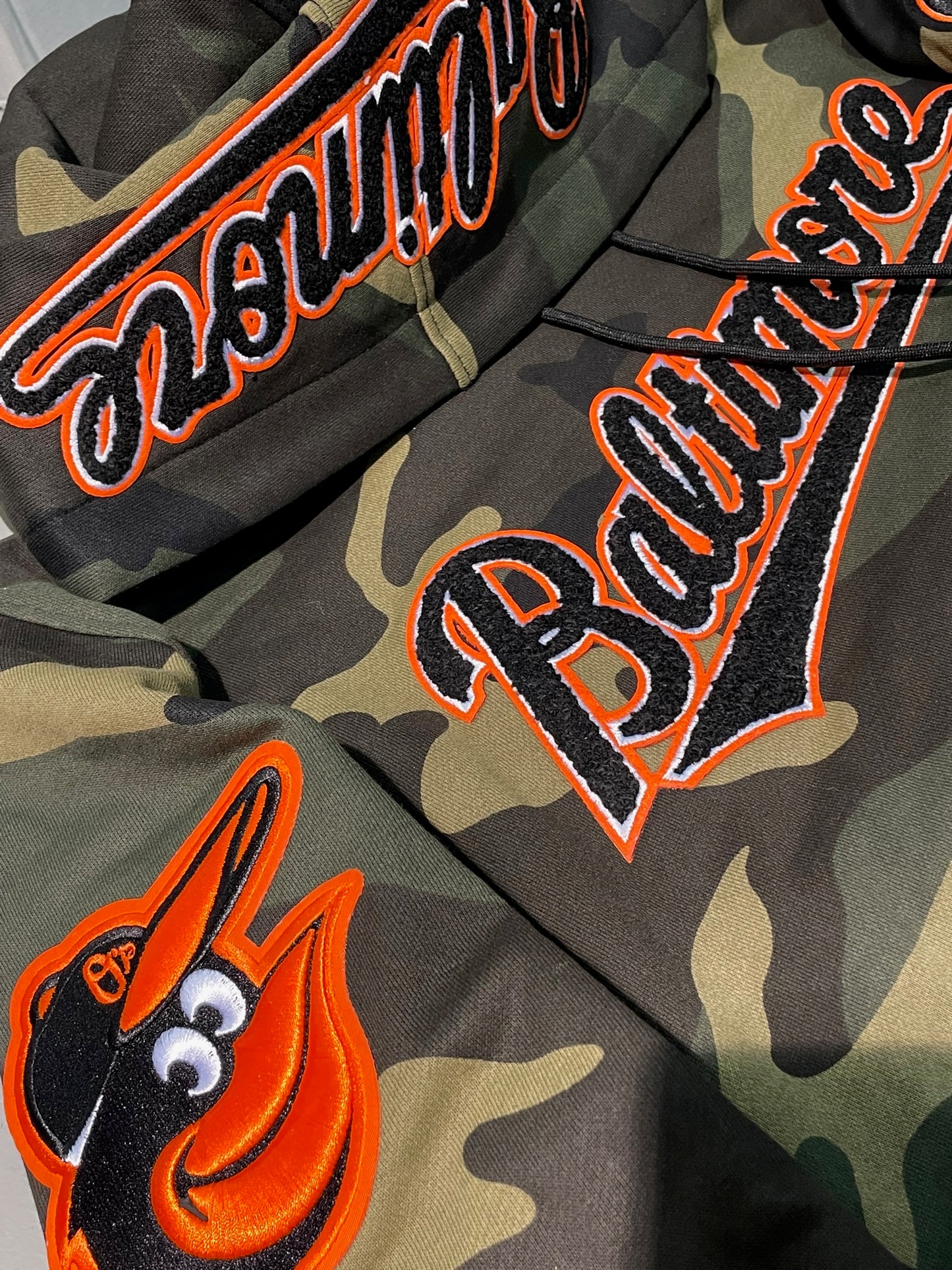 Baltimore Orioles Pro Standard Logo Pro Team Olive Camo Hoodie